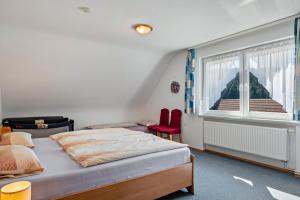 Postel nebo postele na pokoji v ubytování Unterfalkenhof