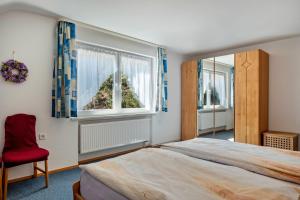 Postel nebo postele na pokoji v ubytování Unterfalkenhof