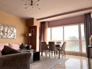 Posezení v ubytování Cosy appartement au super centre ville avec vue partielle sur le parc