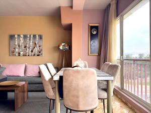 Posezení v ubytování Cosy appartement au super centre ville avec vue partielle sur le parc + 7 fotografií