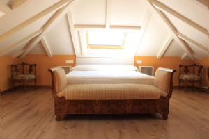 Postel nebo postele na pokoji v ubytování Hostal Siglo XIX