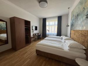 Letto o letti in una camera di Hotel Secession an der Oper