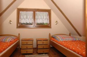 Llit o llits en una habitació de Stonka