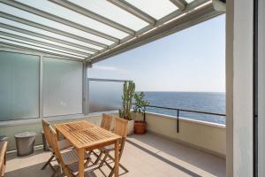 Φωτογραφία από το άλμπουμ του Sea Side Home Sanremo vista mare σε Ospedaletti