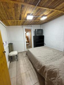 TV a/nebo společenská místnost v ubytování Departamentito Cabral