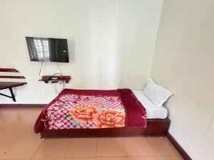 Letto o letti in una camera di Hotel SilverLine Regency Munnar