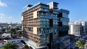 a rendering of a tall building with balconies at New Time 715 - Luxo à beira-mar da Pajuçara in Maceió