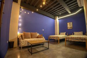 Letto o letti in una camera di 小島月光民宿 Moonlit Isle