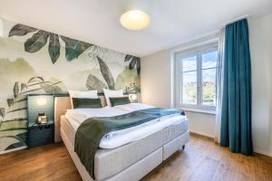 Postel nebo postele na pokoji v ubytování Hotel Central am See