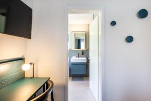 Letto o letti in una camera di Hotel Central am See