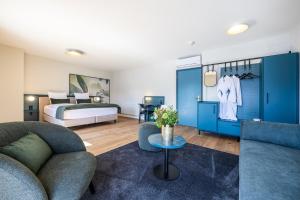 Letto o letti in una camera di Hotel Central am See
