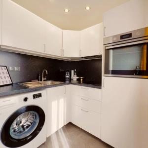 Kuchyň nebo kuchyňský kout v ubytování Apartment in zentraler Lage