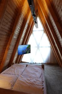 Postel nebo postele na pokoji v ubytování Eko Farma Sisevac