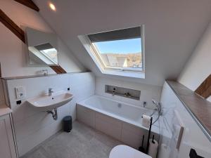 Koupelna v ubytování Ferienwohnung Moselzeit Mehring + 18 fotografií