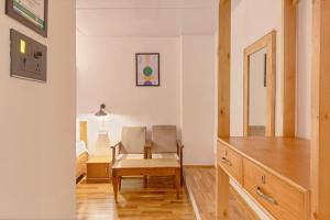 Posezení v ubytování Treebo Vitasta Villa, Srinagar