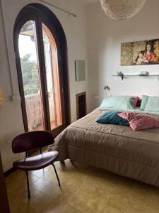 Ένα ή περισσότερα κρεβάτια σε δωμάτιο στο Casa Vacanze Daniela