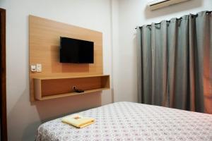 Postel nebo postele na pokoji v ubytování Hotel Karanda´y