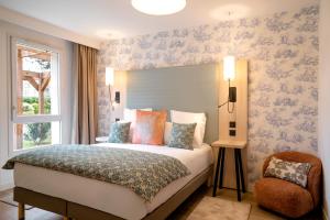Katil atau katil-katil dalam bilik di Residhome Paris-Guyancourt