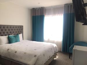 Blub Hotel Spa客房内的一张或多张床位