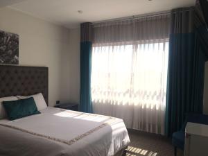 Blub Hotel Spa客房内的一张或多张床位