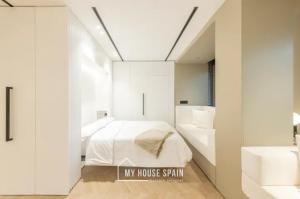 Postel nebo postele na pokoji v ubytování MyHouseSpain - Luminoso piso en Chamberí
