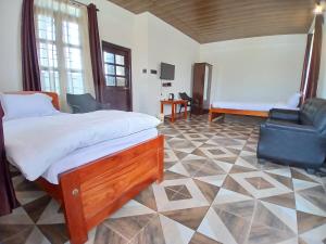 Postel nebo postele na pokoji v ubytování The coralberry Inn