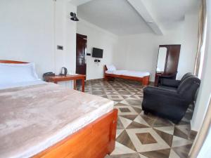 TV a/nebo společenská místnost v ubytování The coralberry Inn + 27 fotografií