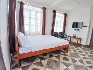 TV a/nebo společenská místnost v ubytování The coralberry Inn