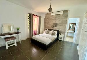 A bed or beds in a room at Villa Sharm Family Vacation