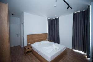 Postel nebo postele na pokoji v ubytování Hotel Besani