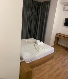 Postel nebo postele na pokoji v ubytování Hotel Besani