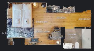 a floor plan of a wooden wall with different items at Cute and central studio - Sun 11 in Zurich
