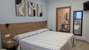 Postel nebo postele na pokoji v ubytování Hotel Rural la Plaza