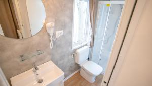 Koupelna v ubytování Happy Camp in Don Antonio Glamping Village + 14 fotografií