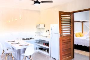 Katil atau katil-katil dalam bilik di #1 Flat das Oliveiras Pipa Private Jacuzzi and AR +16 gambar