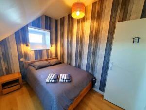 Postel nebo postele na pokoji v ubytování La laurentaise-vue mer + 15 fotografií