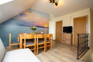 Μια τηλεόραση ή/και κέντρο ψυχαγωγίας στο Strandi Apartmanok- Magyar Tenger