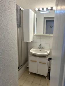 Ένα μπάνιο στο appartement au bord de l'océan