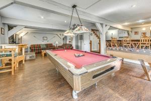 a living room with a pool table in it at Half-Mi to Midtown Family Retreat with Mtn Views! in Ruidoso
