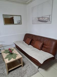 A seating area at Apartman Fontana