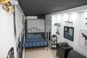 Tempat tidur dalam kamar di Génesis Lakes Near San Juan