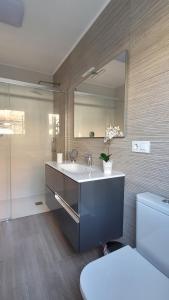 Koupelna v ubytování Besbello Suites Apartamento