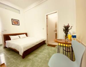Postel nebo postele na pokoji v ubytování Hue Harmony Homestay