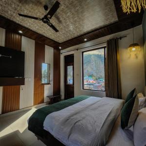 Postel nebo postele na pokoji v ubytování Hotel Mahadev
