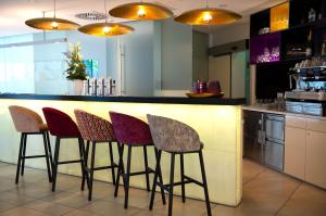 A kitchen or kitchenette at arte Hotel Linz