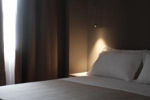 Didimos Town Hotel客房内的一张或多张床位