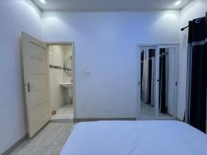 Giường trong phòng chung tại Villa Hortensia F4 RDC