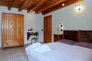 Postel nebo postele na pokoji v ubytování La Vrille - chambres d'hôtes