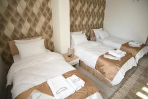 Postel nebo postele na pokoji v ubytování Hotel Alisa