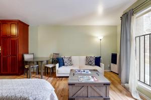 a living room with a couch and a table at Elkhorn Angani 54 in Sun Valley